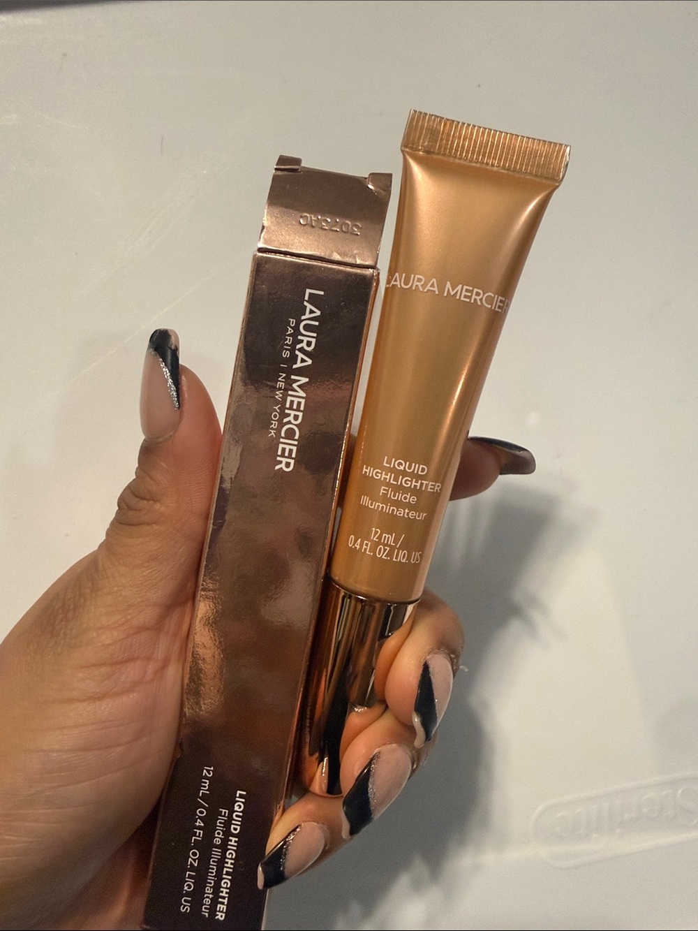 laura mercier Liquid Highlighter – peach bronze
